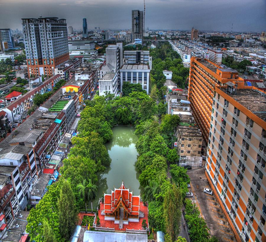 Bangkok seen from above the Hua Mak campus, with a temple among the buildings